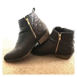 Brown ankle booties with gold zippers